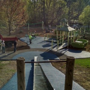 View of the playground from the top of a long hill slide