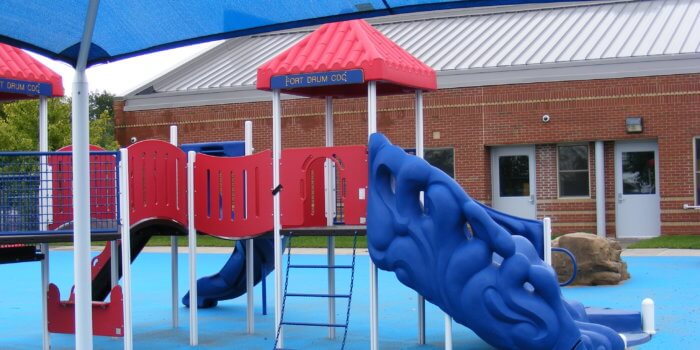 Photo of playground with shade structure.