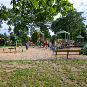 Photo of an expansive playground, with slides, spinners, climbers, ramps, swings, and more.