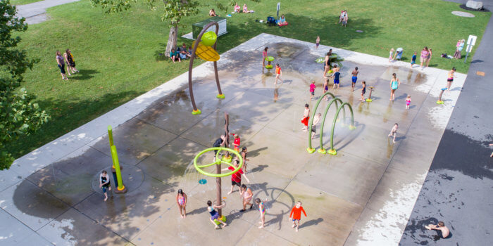 Photo of spray park with water sprinklers, domes, and sprayers.